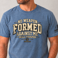 Blue Jean Comfor Colors Tee with No Weapon Formed Against Me Shall Prosper printed on the front and the MOG Apparel Flag Logo on the left sleeve.